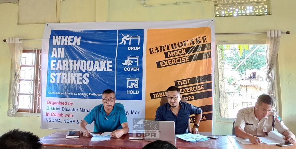 Officials and others during the Tabletop Exercise conducted in preparation for the mock exercise at Tizit, Mon on July 15. (DIPR Photo)